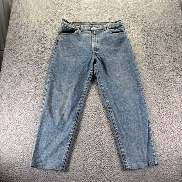 Vintage Levis 550 Jeans Mens 34x28 Blue Light Wash Cotton Loose Tapered Made USA